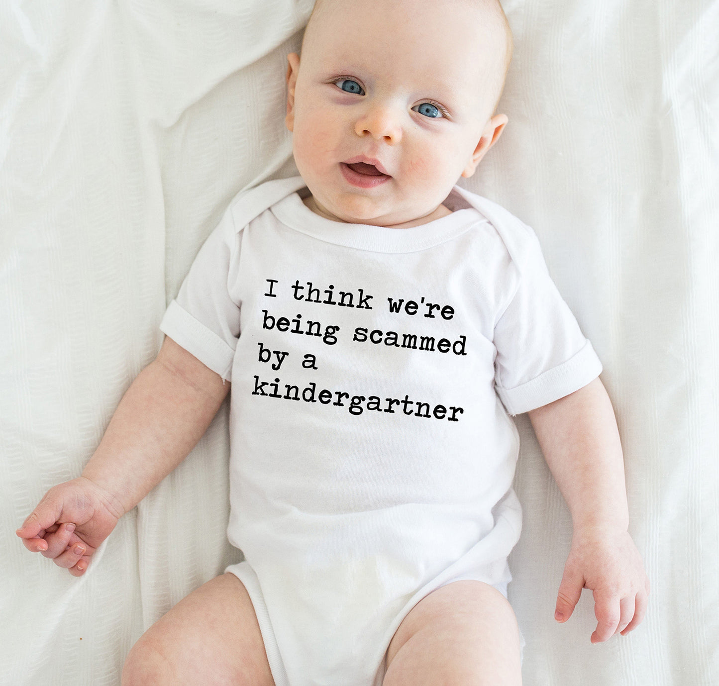 I Think We're Being Scammed By a Kindergartner - Short Sleeve Kids Shirt
