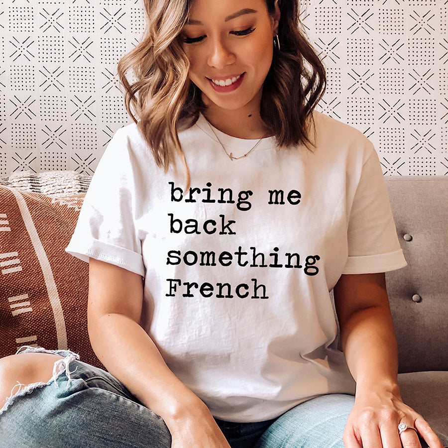 Bring Me Back Something French Unisex Tee