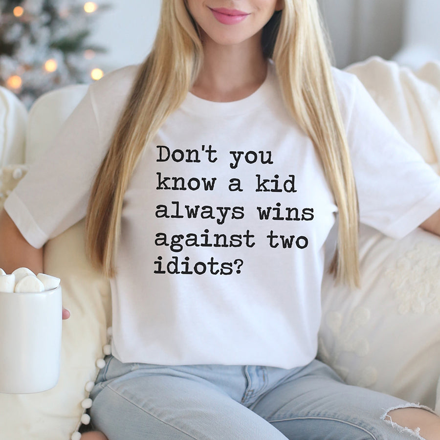 A Kid Always Wins Against Two Idiots Unisex Tee