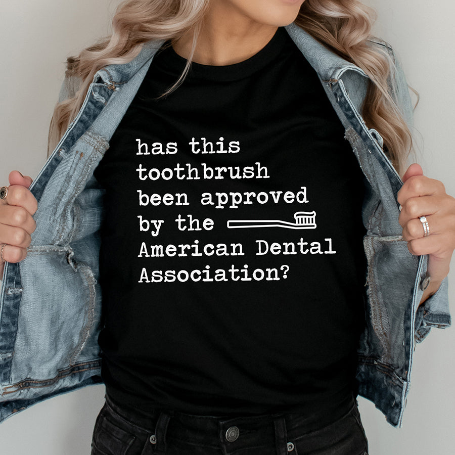 Has This Toothbrush Been Approved Unisex Tee