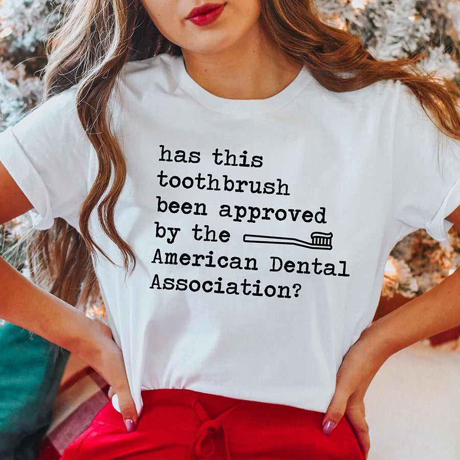 Has This Toothbrush Been Approved Unisex Tee