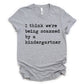 I Think We're Being Scammed By A Kindergartner Unisex Tee